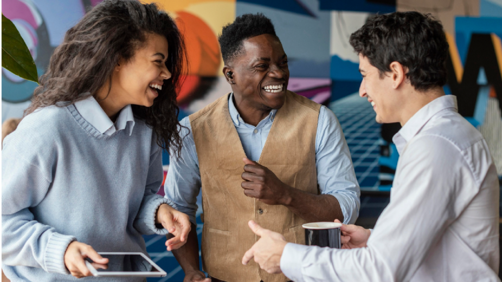 Coworkers at the office conversing