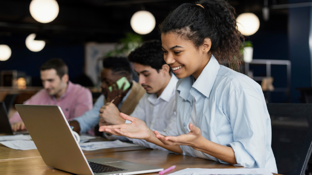 A woman having a video call at the office